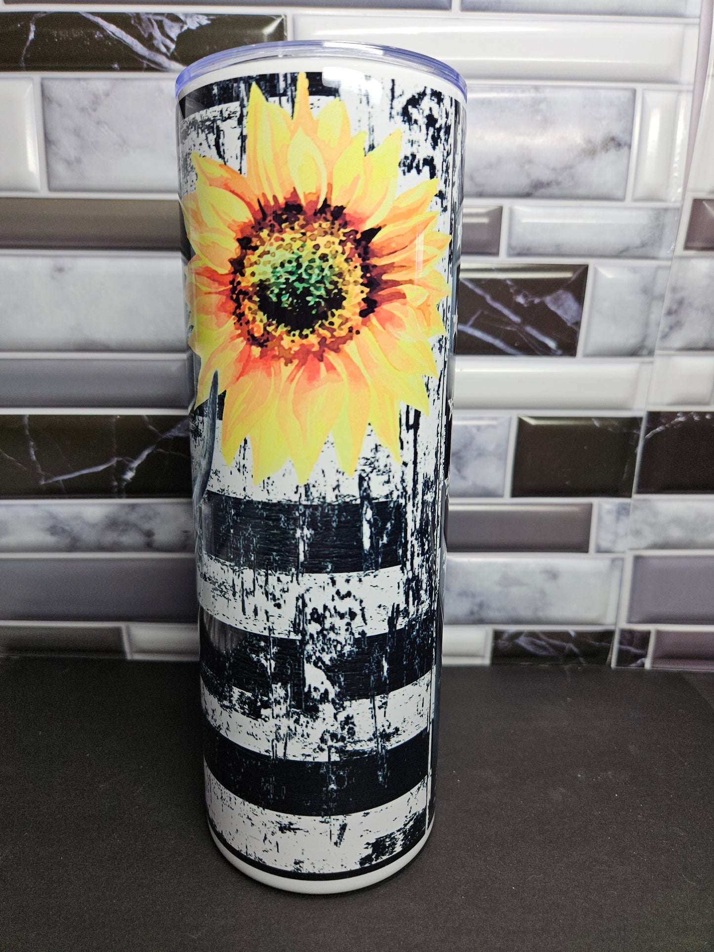 Heiffer with Sunflower and distressed flag 20 oz. Stainless tumbler